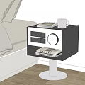 Modern Black White Bedside Table With Silver Mug Notebook Radio Books on Metal Stand