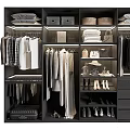 Organized Modern Wardrobe Interior with Hanging Clothes Folded Garments Shoes Storage Boxes and Drawers