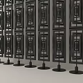 Black Decorative Room Screens With Intricate Patterns Arranged On Stands Indoors