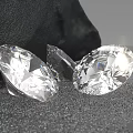 Oval Transparent Sparkling Diamonds With Brilliant Cut Facets On Black Background