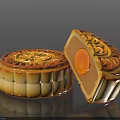 Traditional Chinese Golden Mooncake With Whole And Cut Design Showing Yolk Filling