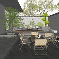 Outdoor Courtyard Garden With Fire Pit Seating Area Wooden Table And Green Plants