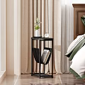 Minimalist White Side Table With Vase Clock And Magazines In Bedroom Setting