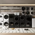 Modern Black And White Washing Machines In Laundry Room With Hangers And Storage