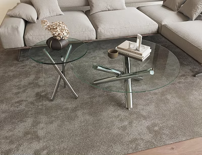 Modern Glass Coffee Table with Cross Metal Legs Vase Books and Cup on Living Rug 3d model