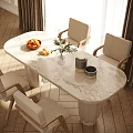 Modern Oval Dining Table Set With Marble Tabletop Beige Chairs Fruit Bowl And Flower Vase