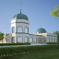European Architecture Featuring Green Domes White Walls Large Windows Trees And Lawn Under Blue Sky