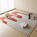 Square Rug Featuring Red Grey White Geometric Pattern With Fresh Flowers Magazines And Throw Blanket