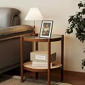 Modern Side Table with Sofa Table Lamp Picture Frame Books and Green Plant