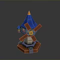 Colorful Windmill Tower Model With Blue Spire Orange Blades Yellow Tip And Red Brick Base