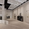 Clothing Store Exterior with Arched Entrance Window Display Mannequins White Building Street and Green Trees