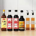 Various Condiment Bottles With Different Labels On Kitchen Counter For Seasonings