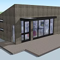Modern Detached Villa Featuring Wooden Exterior And Large Glass Doors With Paved Entrance