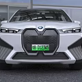 White BMW Electric Car With Modern Front Grille And Sleek Body Design
