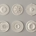 Carved Decorative Medallions with Intricate White Ceiling Design Patterns 3d model