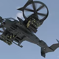 Black Armed Military Helicopter With Weapon Systems Flying In Clouds