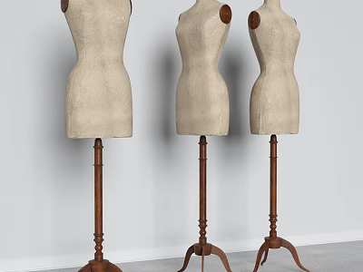 Three Beige Mannequins With Wooden Stands Against White Wall In Studio 3d model