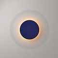 Modern Minimalist Wall Light with Round Deep Blue Center Warm Yellow Glow on White Wall