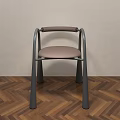 Modern Dining Chair With Gray Frame And Brown Seat On Herringbone Wooden Floor