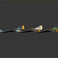 Colorful Toy Airplane Models With Vibrant Green Blue Yellow Wings And Red Accents