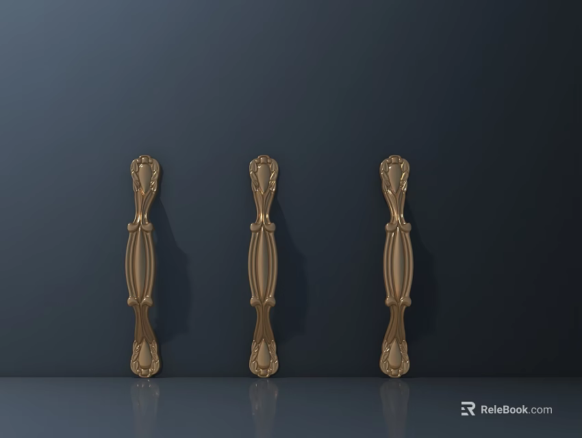 Golden Carved Decorative Handles for Furniture with Intricate Patterns on Dark Surface 3d model 