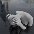 White Human Sculpture Head Bowed With Hand Resting On Greenery And Water Reflection Background