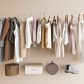 Stylish Clothes Hanging on Beige Wall with Various Styles Neutral Colors Boxes and Shoes