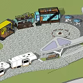 RV Campsite With Circular Stone Paved Area Fire Pit Tents Umbrellas And Trees