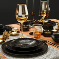 Elegant Black Dinnerware Set With Gold Wine Glasses Pine Cone Decorations And Cutlery