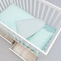 White Baby Crib with Drawers Light Green Mattress Sheets and Hanging Blanket