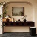 Modern Natural Entryway Console Table With Circular Cutouts Table Lamp Sculpture Green Plants Wall Painting