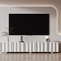 Modern White TV Stand With Flat Screen TV And Decorative Items In Living Room