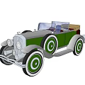Vintage Green Convertible Car With Tan Top Classic Design Silver Accents And Large Wheels