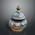 Artistic Sculpted Jar With Lid Featuring Colorful Figure Patterns And Golden Top Decoration