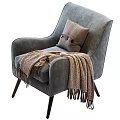 Comfortable Gray Upholstered Single Sofa with Brown Pillow and Cozy Throw Blanket 3d model