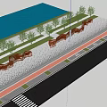 Outdoor Square With Red Decorative Walls Paved Ground And Trees Under Blue Sky