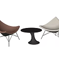 Modern Table and Chair Set Featuring Brown White Seats Black Round Top Metal Legs