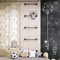Kids Room With Hexagon Wall Chalkboard Art Stuffed Toys Hanging Rods And Playful Decor