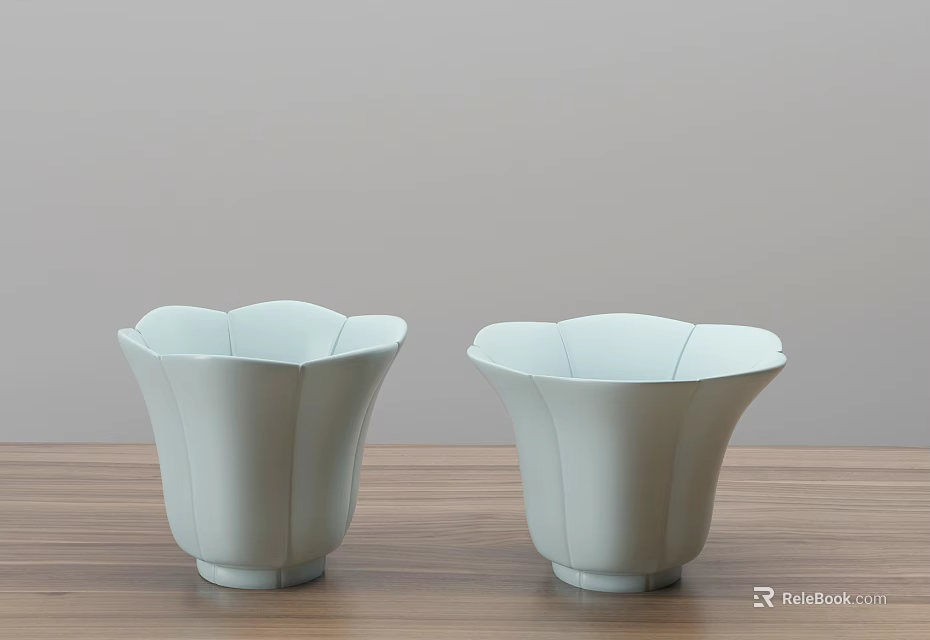 Two Light Blue Flower Shaped Cups Placed On Wooden Surface Against Light Grey Background 3d model