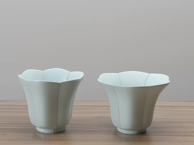 Two Light Blue Flower Shaped Cups Placed On Wooden Surface Against Light Grey Background 3d model