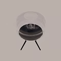 Modern Glass Shade Table Lamp With Black Tripod Base And Warm Lighting Design