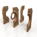 Ornate Carved Bronze Sculptures With Curved Shapes Ring Elements And Intricate Patterns