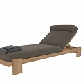 Modern Wooden Frame Lounge Chair With Gray Cushion And Stacked Towels