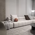 Modern Living Room Design With White Sofa Checkered Blanket Pillows Woven Ball And Floor Lamp