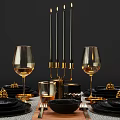 Elegant Black Dinnerware Set With Gold Wine Glasses Pine Cone Decorations And Cutlery
