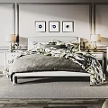 Double Bed Interior With Three Framed Paintings Bedside Tables Lamps Floral Quilt And Gray Blanket