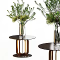Bonsai Plants In Glass Vases On Small Round Tables With Green Foliage