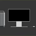 Modern Apple Desktop Setup With Silver Tower Monitor Keyboard And Mouse