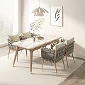 Modern Dining Table Set with Marble Top and Wicker Chairs and Potted Plant Natural Light