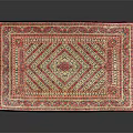 Traditional Decorative Rug With Intricate Geometric Patterns And Vibrant Color Tones